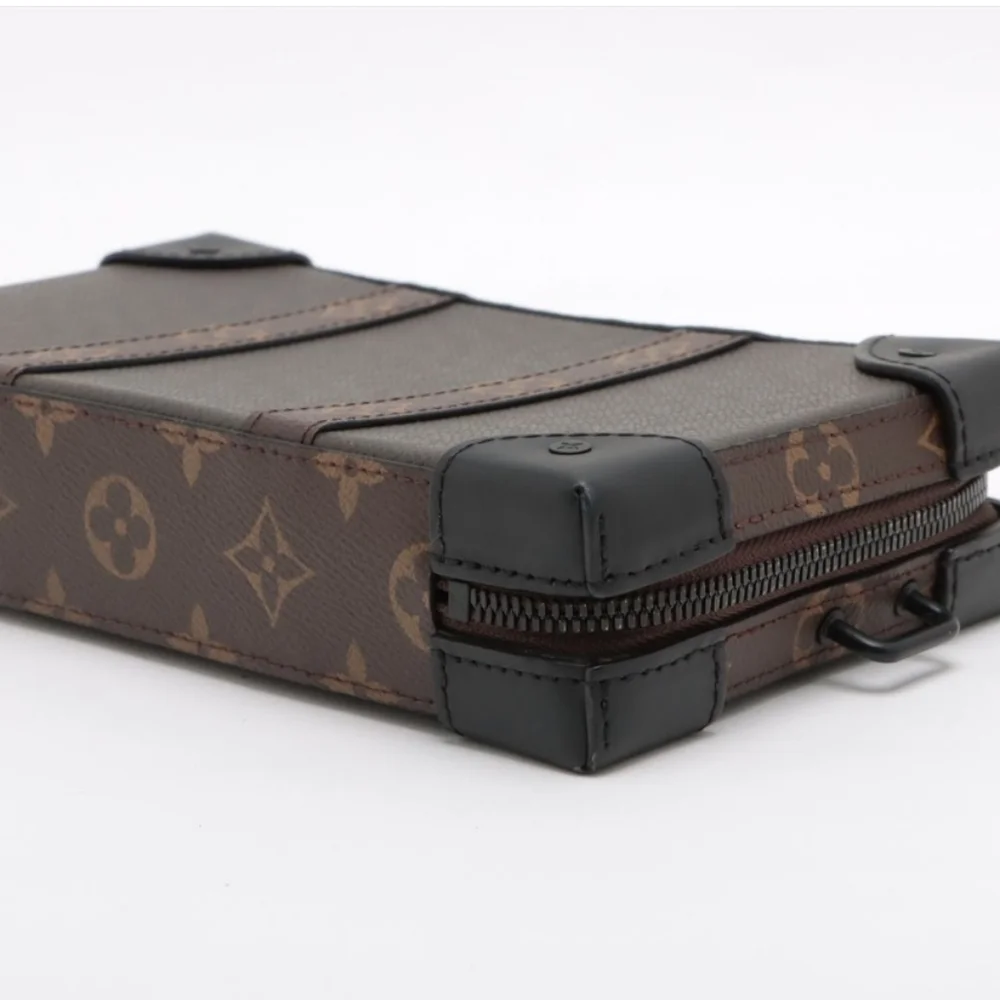 Authentic Louis Vuitton Monogram Taiga Soft Trunk Wallet - Picture 4 of 11